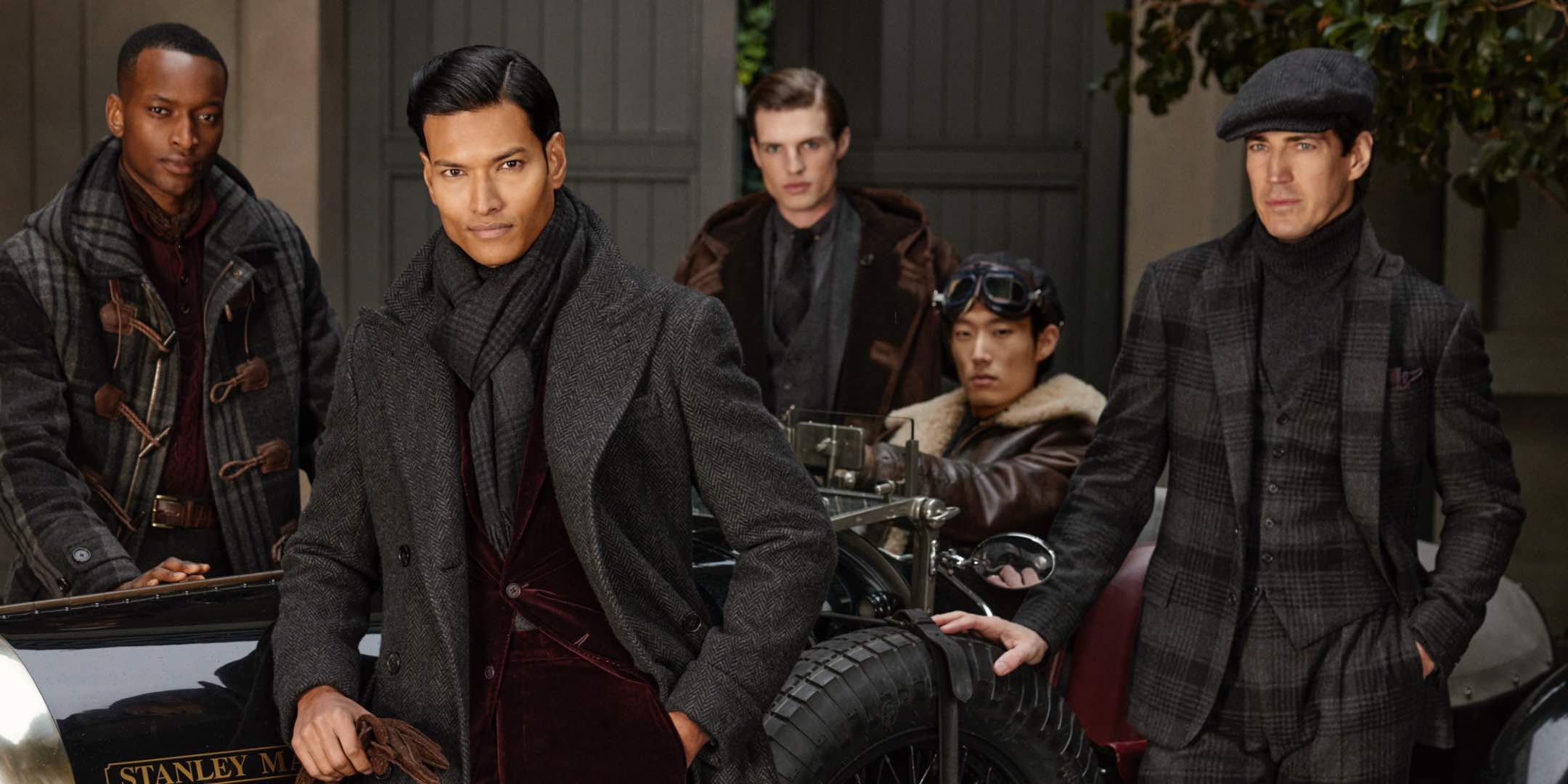 Men wear grey automotive-inspired Purple Label outfits.
